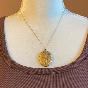 Vintage gold tone floral locket
